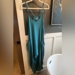 Free People teal hot shot onesie, sz large. NWT